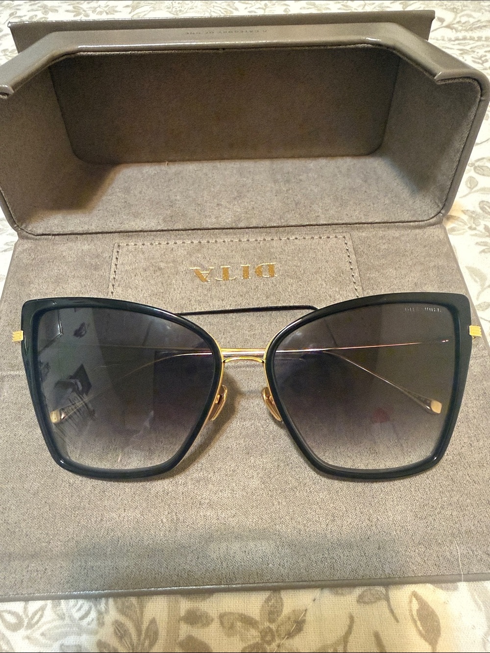 Dita Sunbird Women’s Black and Gold Oversized Cat-Eye Sunglasses